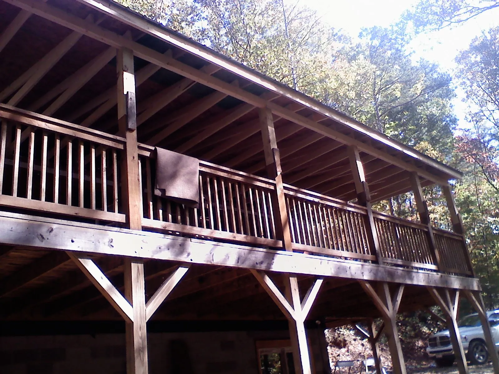 Timber framing under a new elevated porch and deck — Roof Leak Repair in Salisbury by Roofing Brothers
